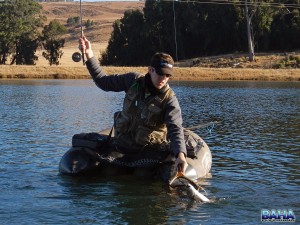 Warren landing a fish