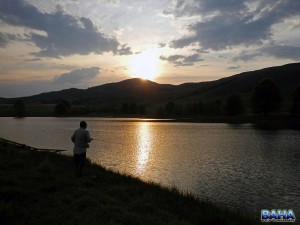 Neill fly fishing at sunset