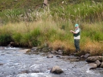 Dad Fishing A Run