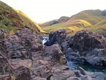 A Small Waterfall Into A Deep Pool At Lotheni