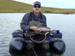 Warren Prior With A Grancehster Rainbow Trout