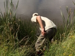 Collecting Water To Acclimatise Fish