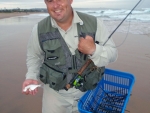 Nick Nortje With A Small Largespot Pompano