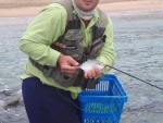 Nick With A Small Yellowtail Kingie