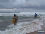 The boys fishing the surf