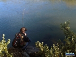 Warren fighting a rainbow trout