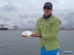 Warren with a pompano