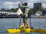 Warren fishing from the Freedom Hawk 12