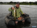 Warren with a small bass