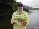 Nick with a bass picked up in a small bay