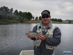 Nick with a trout at Turner\'s Cottage