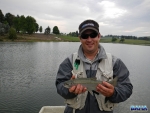 Nick with a trout at Turner\'s Cottage