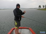 Warren Fishing In The Rain