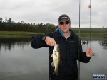 Warren with a bass