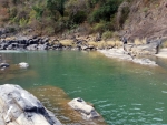 Warren fishing a small pool