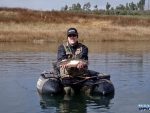 Warren with a nice sized trout