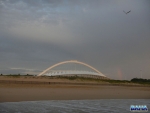 A feint rainbow over Moses Mabida