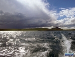 Outrunning a storm on the water