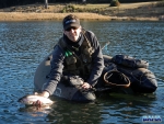 Warren releasing a fish
