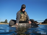 Warren Prior releasing a fish