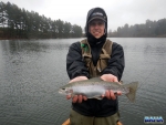 Warren with a trout at Lunds