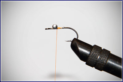 Step 2 of tying a Crazy Charlie