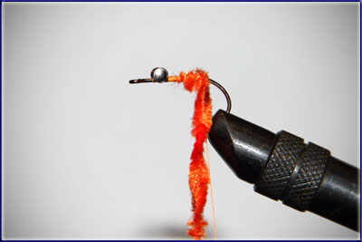 Step 3 of tying a Crazy Charlie