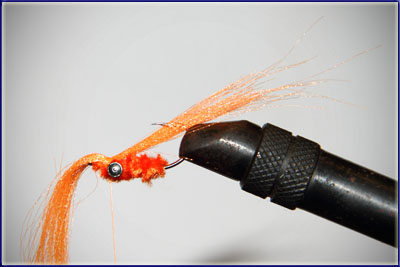 Step 6 of tying a Crazy Charlie